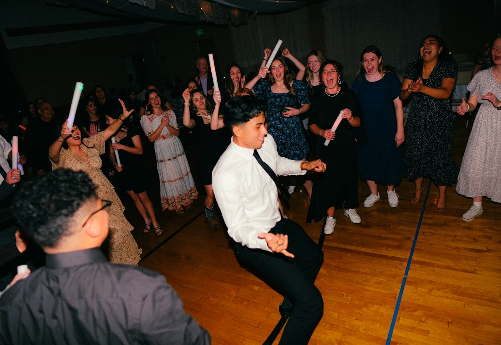 Friends celebrating together on the dance floor